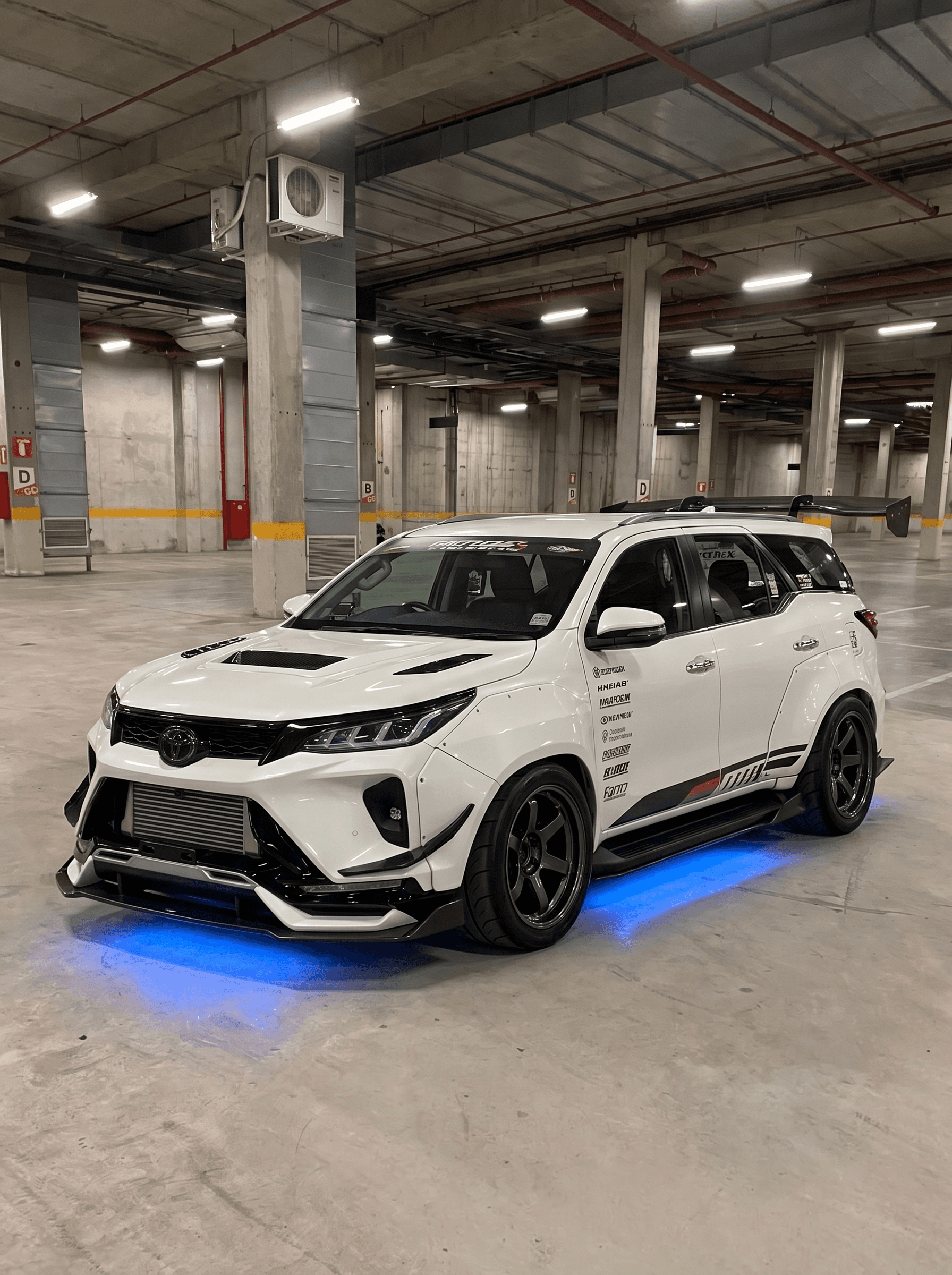 Widebody Toyota Fortuner SUV with blue underglow